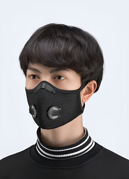 A man wearing an air pollution face mask, showing the side view, designed for optimal protection and comfort, available in Canada.