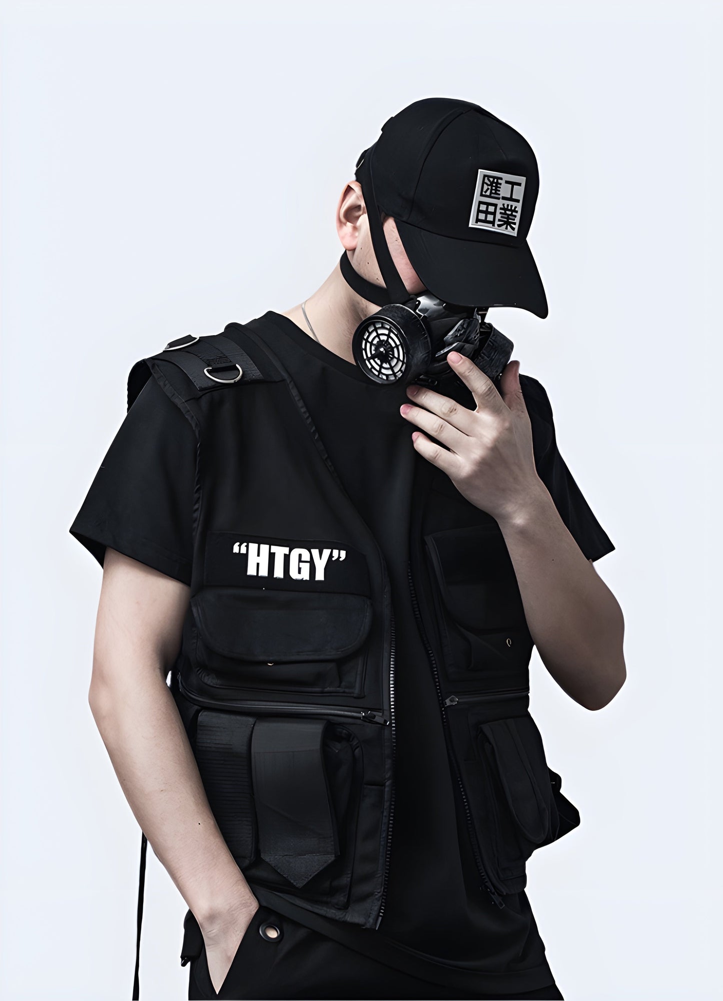 Man showcasing a techwear utility vest from the front view, highlighting its features and fit, available in Canada