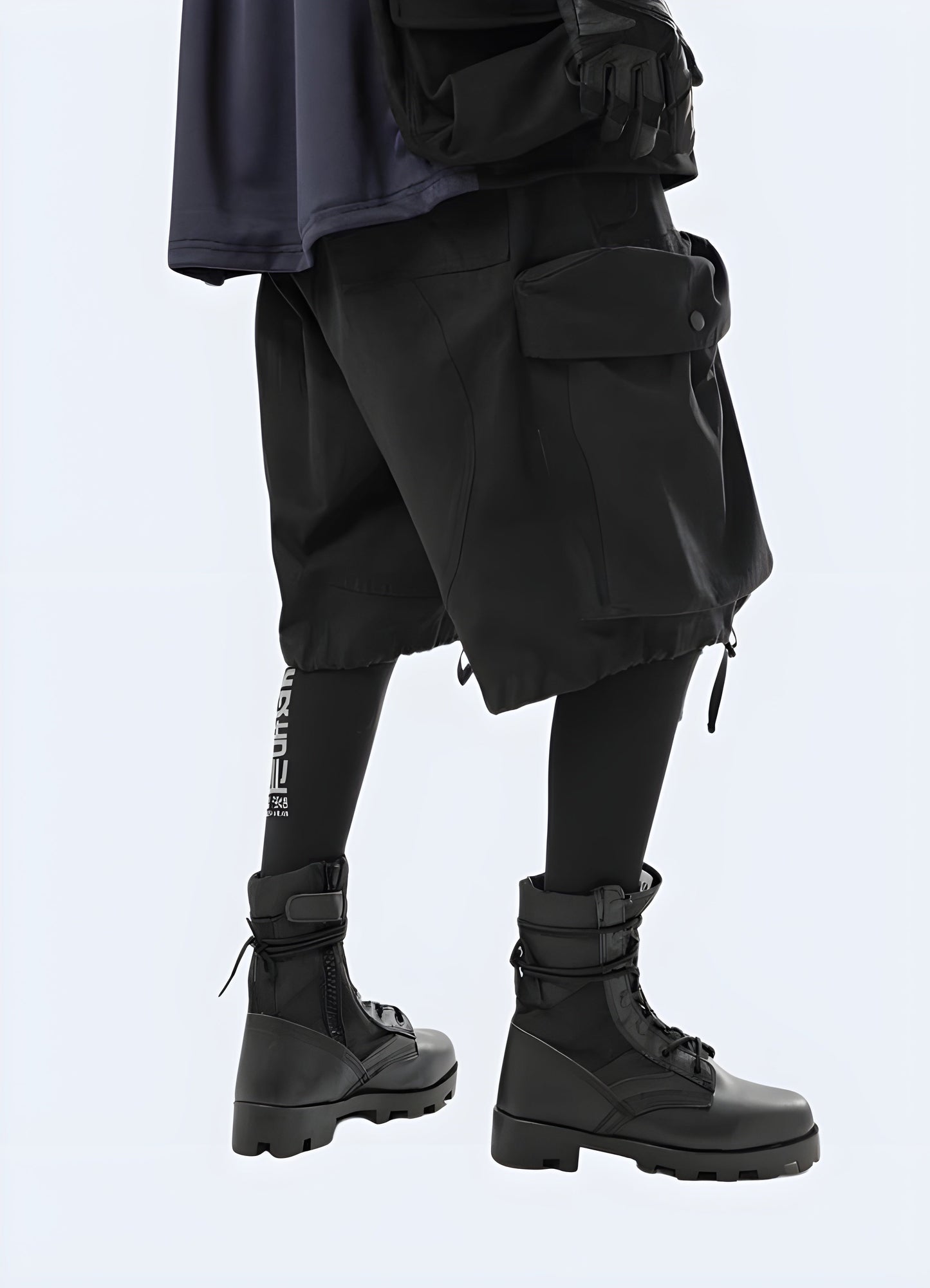 Back view of a man wearing tie up techwear cargo shorts, highlighting the adjustable waistband and spacious pockets, ideal for the Canada adventurer.