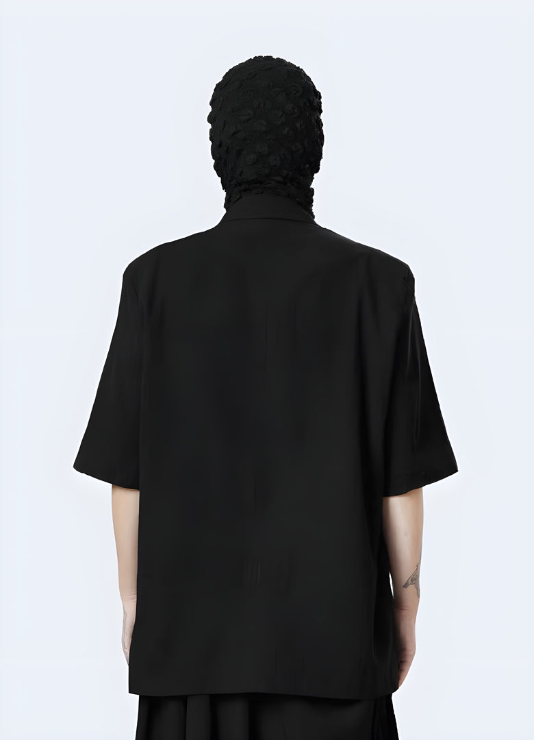 Back view of a man wearing a groundbreaking traditional techwear haori, showcasing the garment's sleek lines, advanced technical materials, and contemporary design that seamlessly blends tradition with innovation.