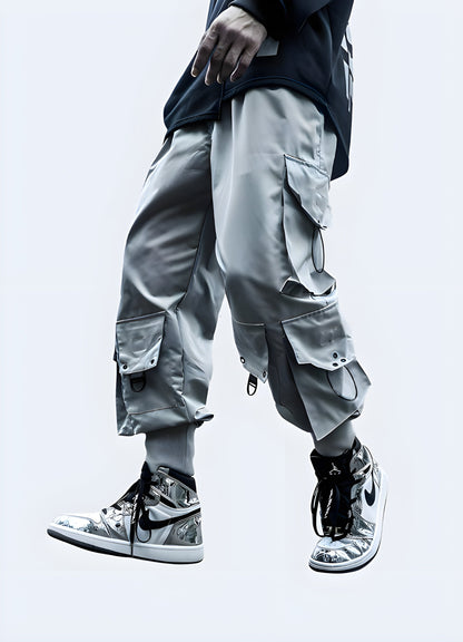 Man wearing grey urban jogger pants, front and side view, demonstrating the perfect blend of comfort and style with a relaxed fit and contemporary details suitable for various urban settings in Canada.