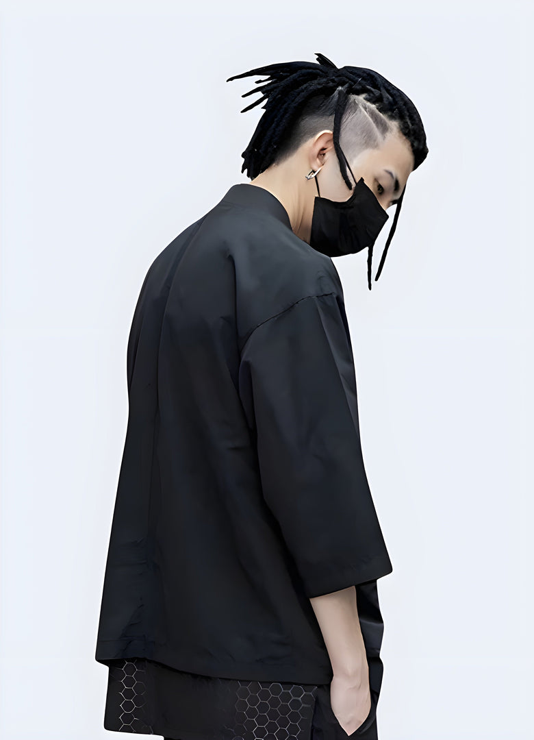 Model showcasing the back view of a modern urban kimono in the Canada, featuring a contemporary twist on the traditional Japanese garment, with a sleek, minimalist design and high-quality fabrics.
