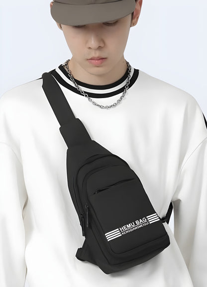 The bag is sleek and modern, with a single strap that crosses his body. The front view emphasizes the bag's design and how it rests comfortably across his chest and torso Canada.