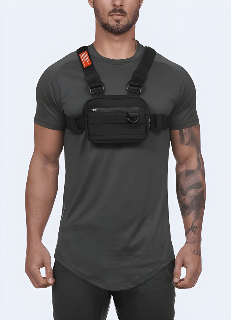 The front view highlights the bag's practical and durable features, emphasizing how it fits securely across the man’s chest and complements his outfit Canada.