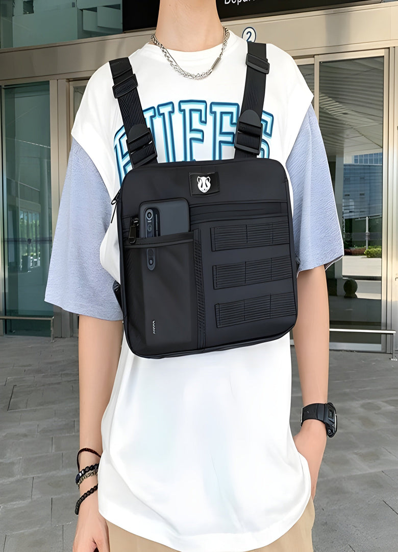 The bag has multiple pockets, adjustable straps, and a practical design for carrying essentials, complementing a casual or functional outfit Canada.