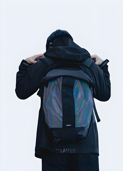 A man wearing a comeback backpack, viewed from the front. The bag features a classic design and is worn across the body or shoulder Canada.