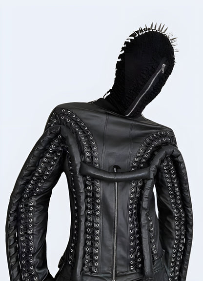 Model showcasing intimidating black spiked full face mask, front view of avant-garde darkwear fashion statement Canada.