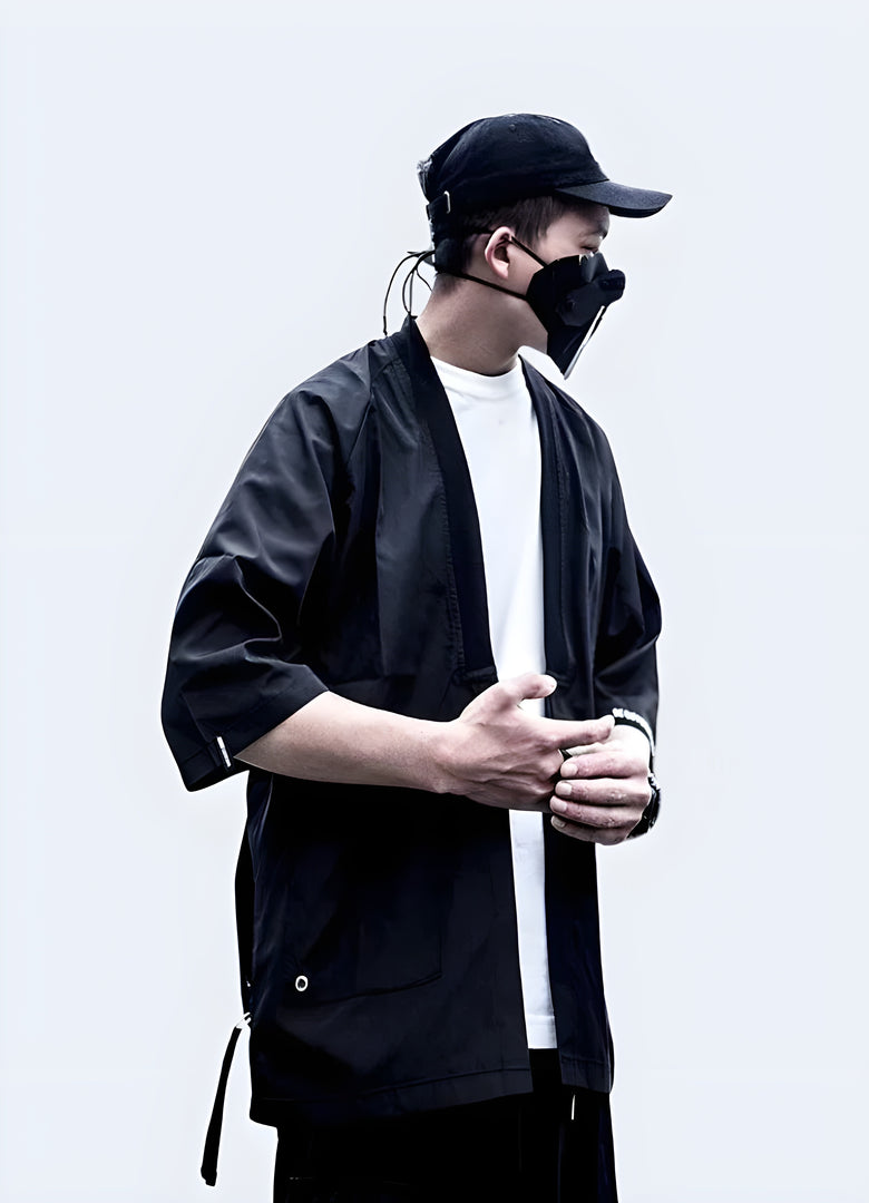 A modern twist on traditional Japanese attire, this image features a man wearing a sleek, futuristic kimono. 