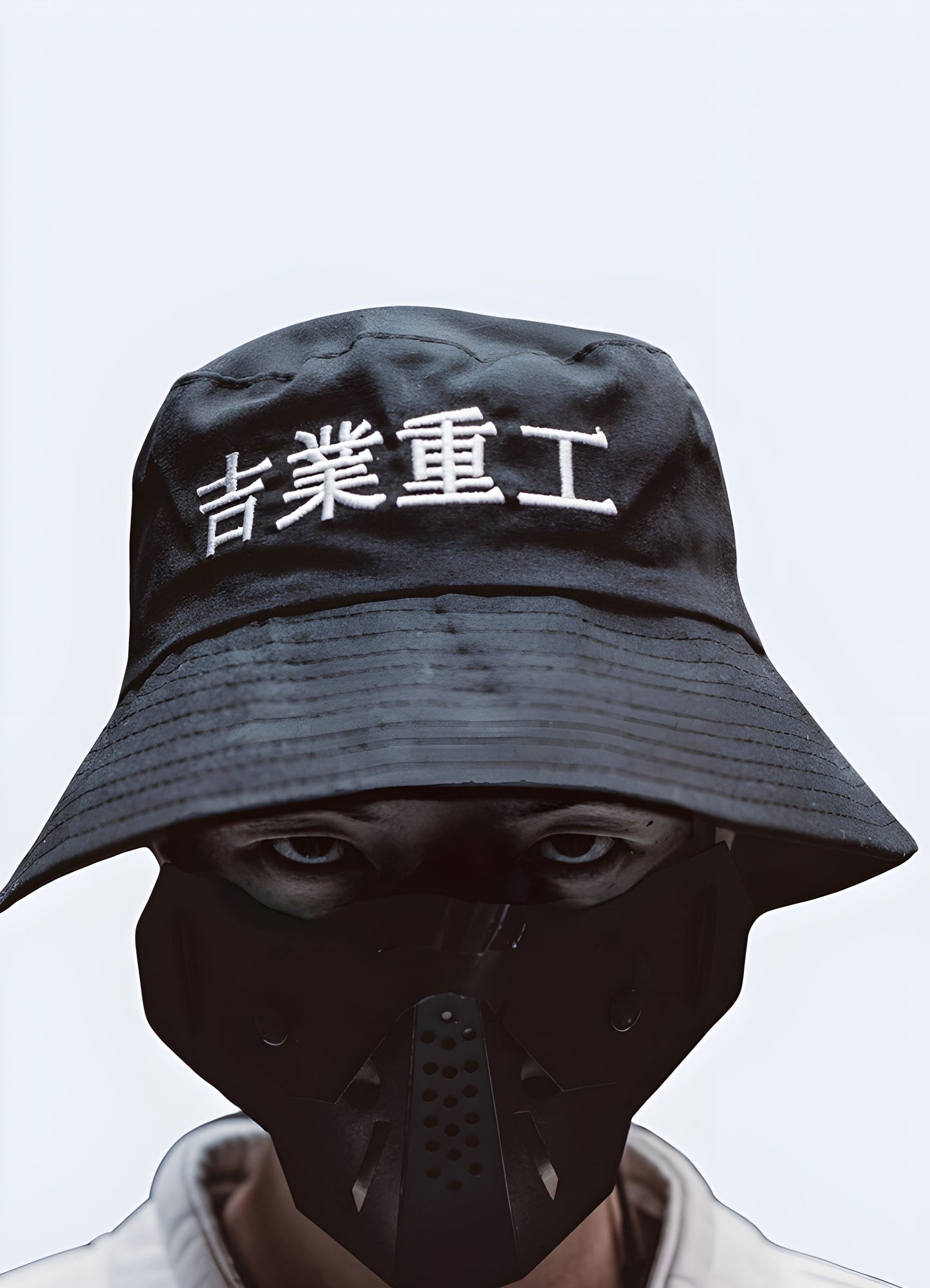 At first glance, the pristine white Kanji lettering that graces the front of the hat reveals its true identity Canada.