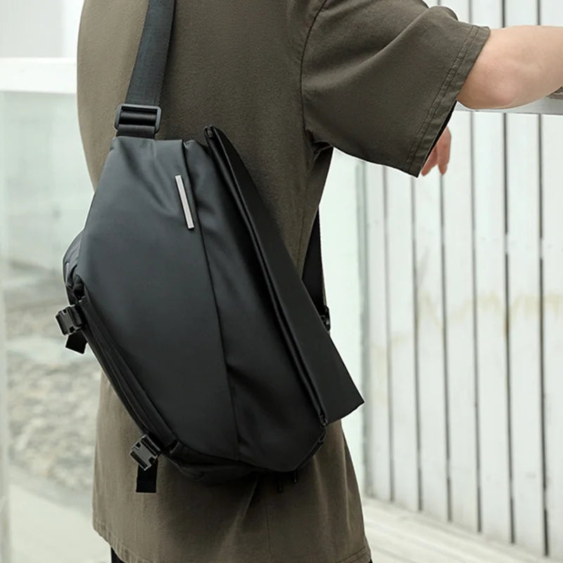 Men wearing a minimalist crossbody bag, front view, showcasing modern fashion. Ideal for a stylish and functional look Canada.