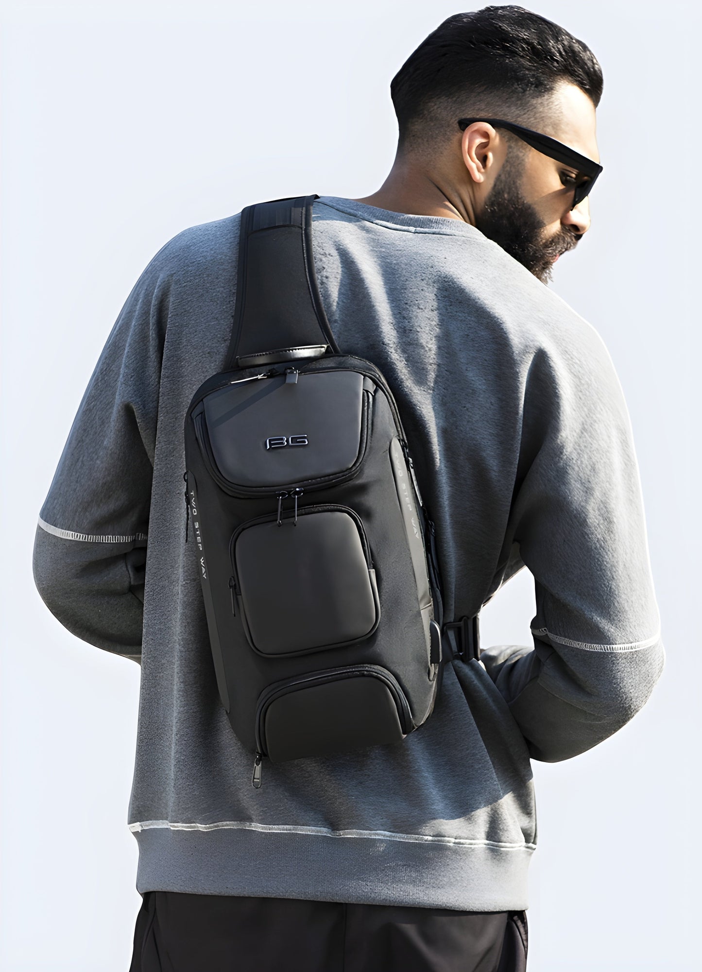 Man wearing a grey sci-fi bag in front view, highlighting the bag's stylish and ergonomic design Canada.