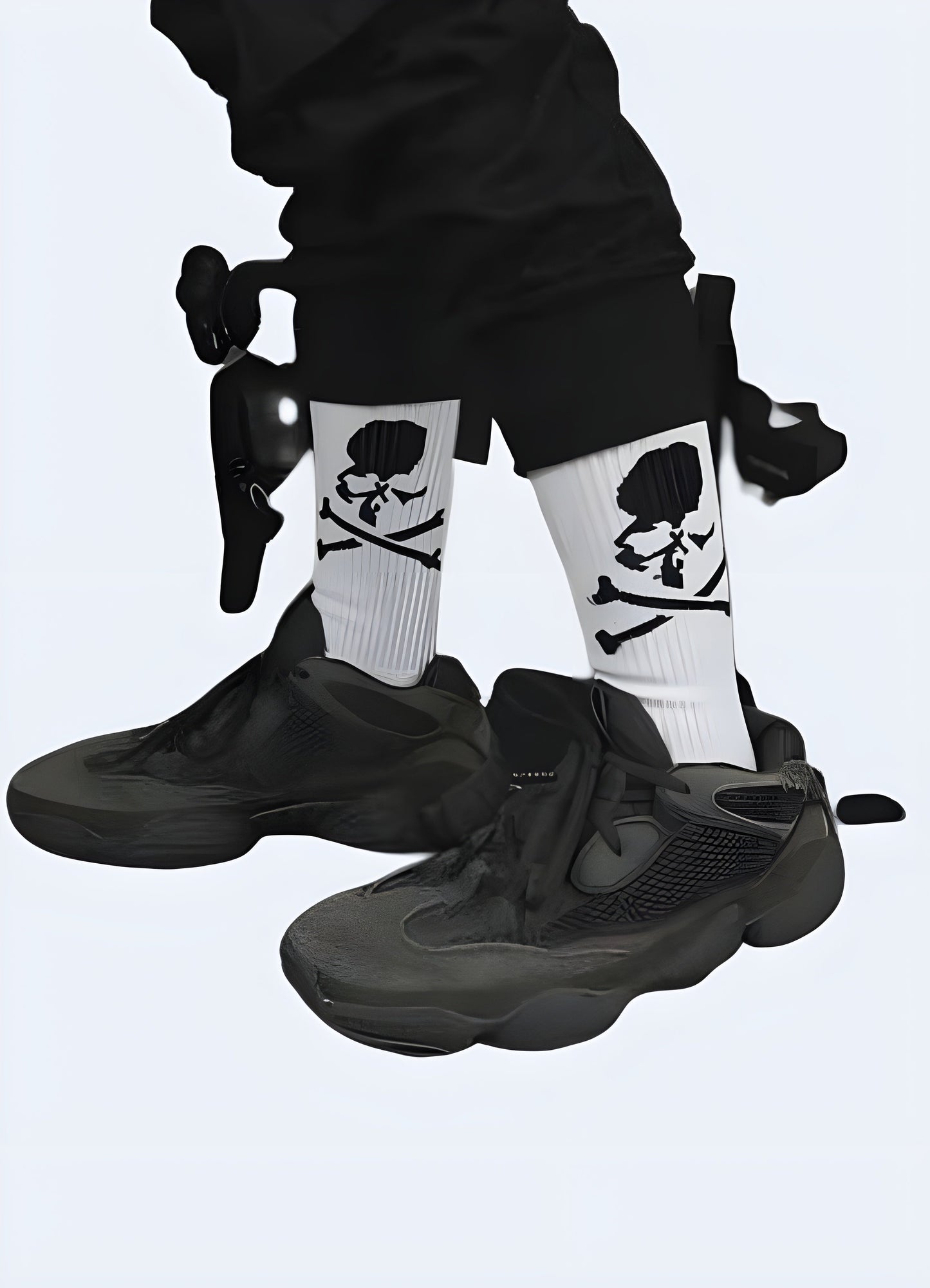 Side view of a man wearing white skull street socks in the Canada. Stylish and trendy sock choice for men.