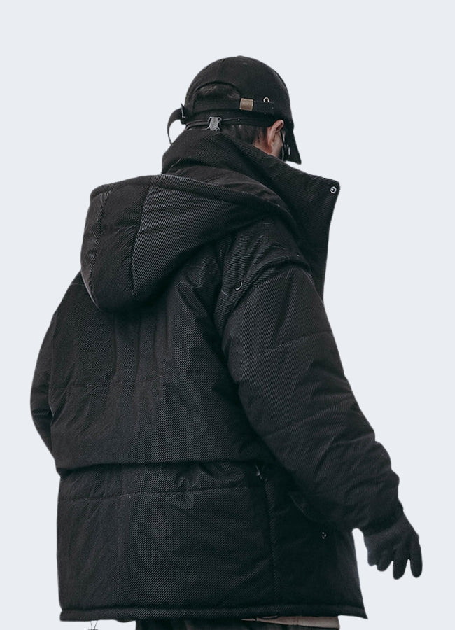 Black men wearing technical winter jacket back side view.