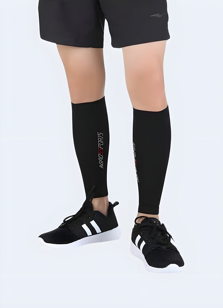 Men wearing techwear leg sleeves, showcasing the sleek and functional design that caters to the needs of Canada sports enthusiasts and urban fashion lovers.
