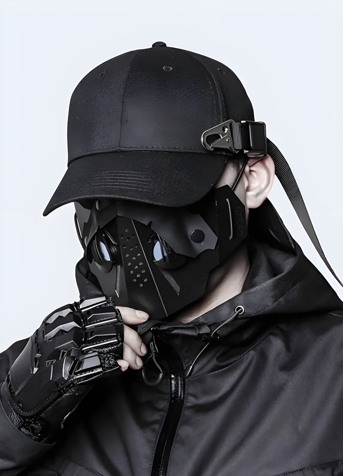 Front view of a man wearing a techwear side buckle cap in the Canada, highlighting its modern and functional style.