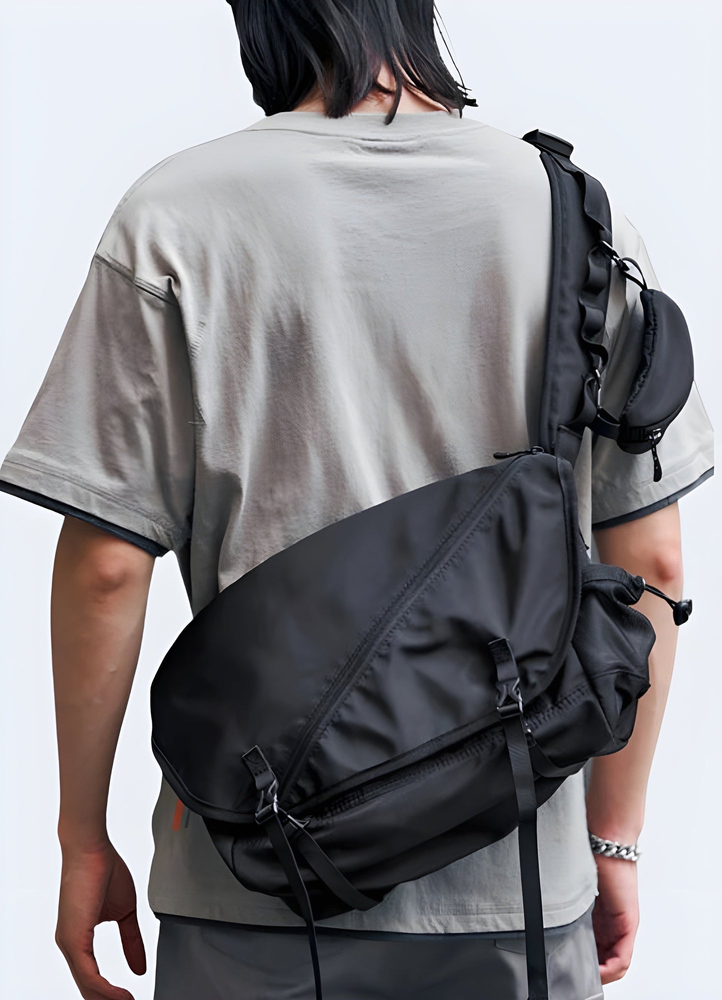 Man wearing a waterproof crossbody bag, front side view, highlighting its functionality Canada.