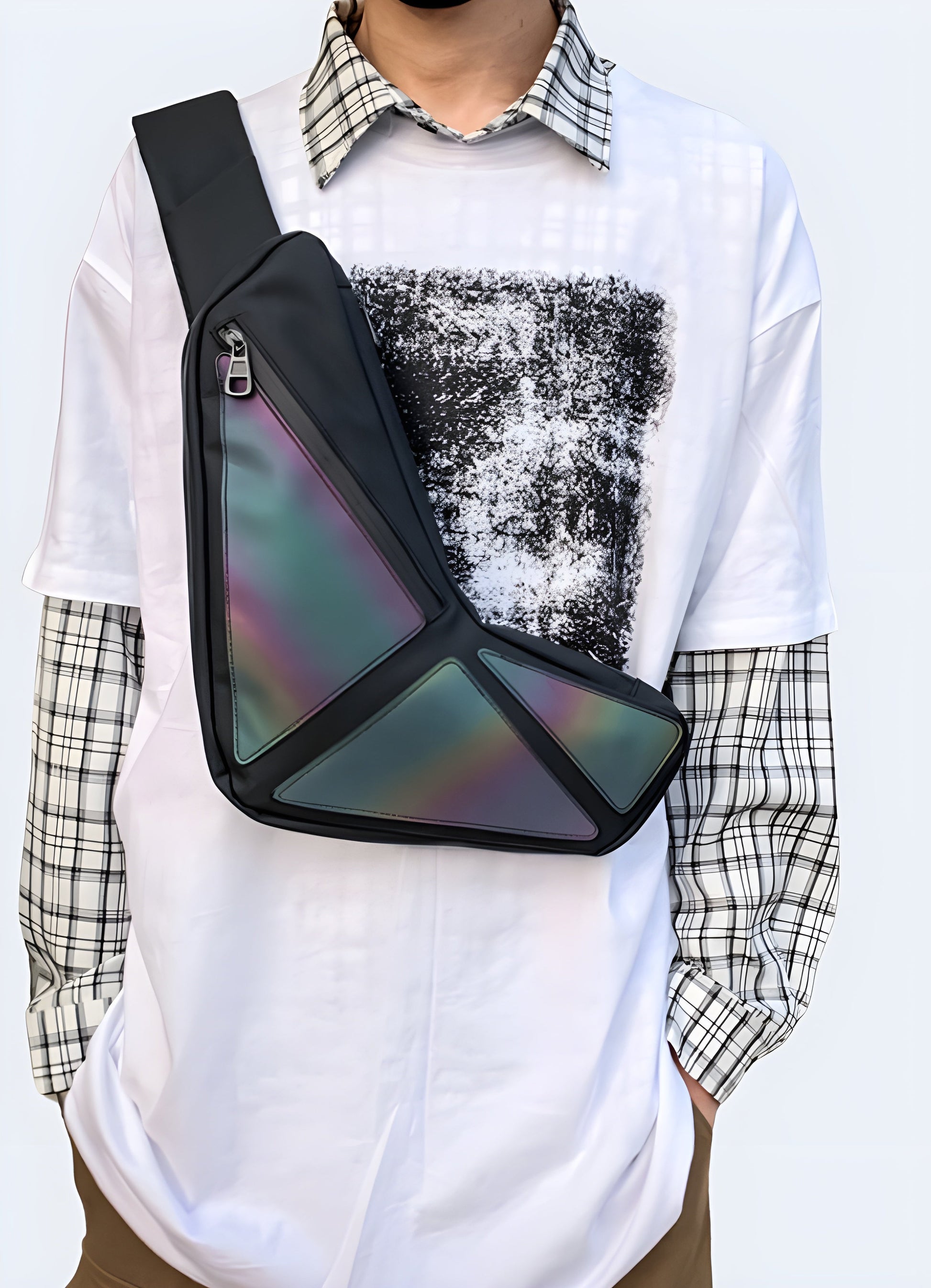 Man wearing a reflective sling bag, front view, showcasing modern and functional style. Ideal for visibility and fashion Canada.