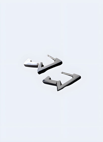 Open view of minimalist techwear silver earrings from the Canada, showcasing their sleek geometric design and modern aesthetic.