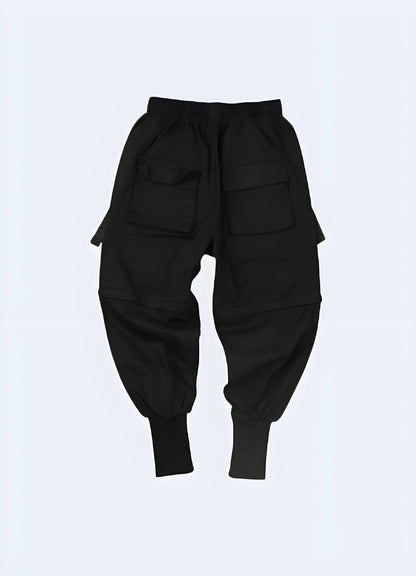 Back view of a model sporting innovative techwear sweatpants, highlighting the premium materials and streamlined design, a must-have for Canada consumers seeking both comfort and modern style.