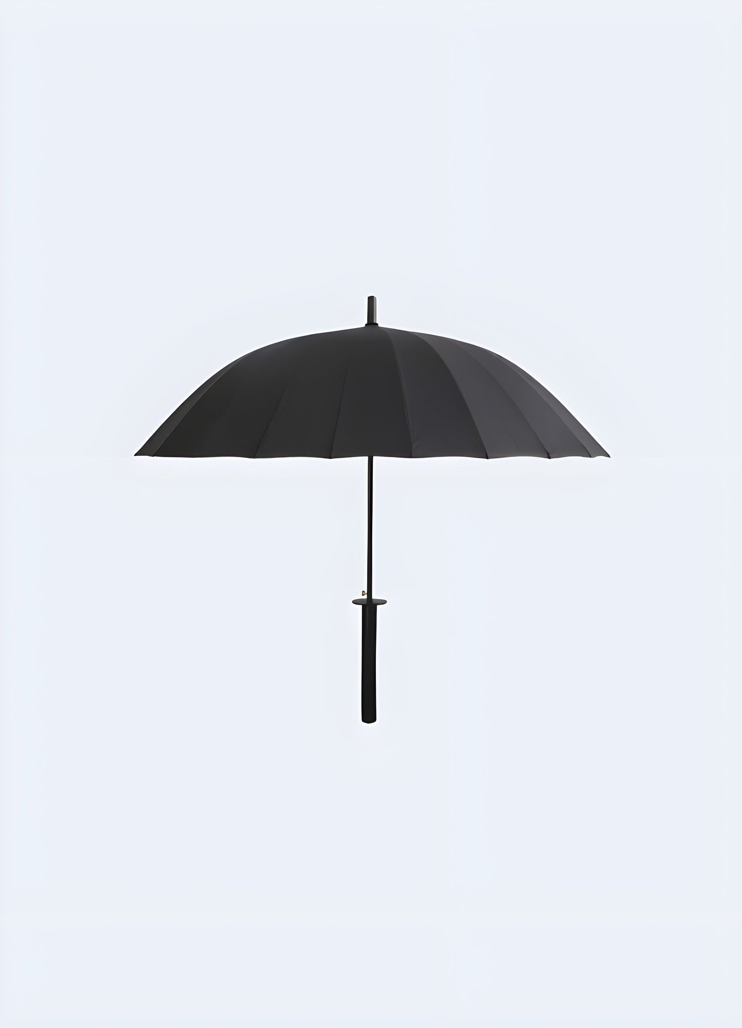 Front view of a model holding a ninja sword umbrella. The handle resembles a sword’s hilt, and the canopy is designed to look like a sword blade Canada.