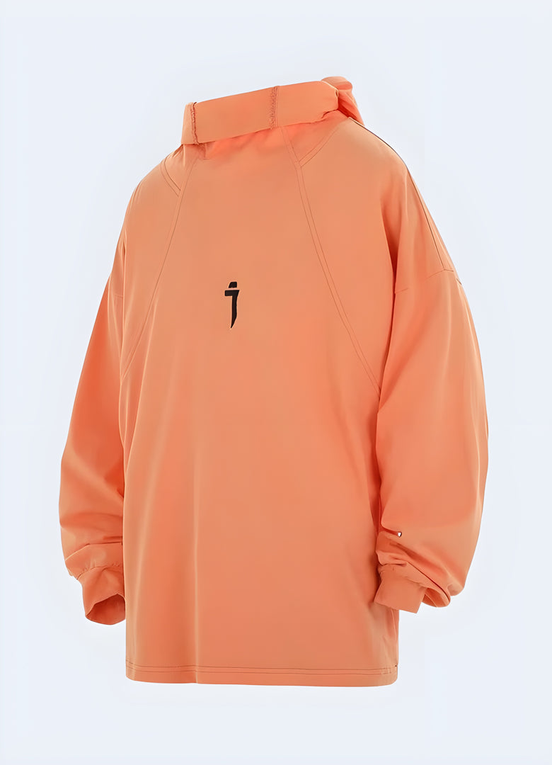 Front view of a person wearing an orange techwear hoodie featuring numerous straps, pockets, and a modern, futuristic aesthetic, perfect for urban adventurers or streetwear aficionados.
