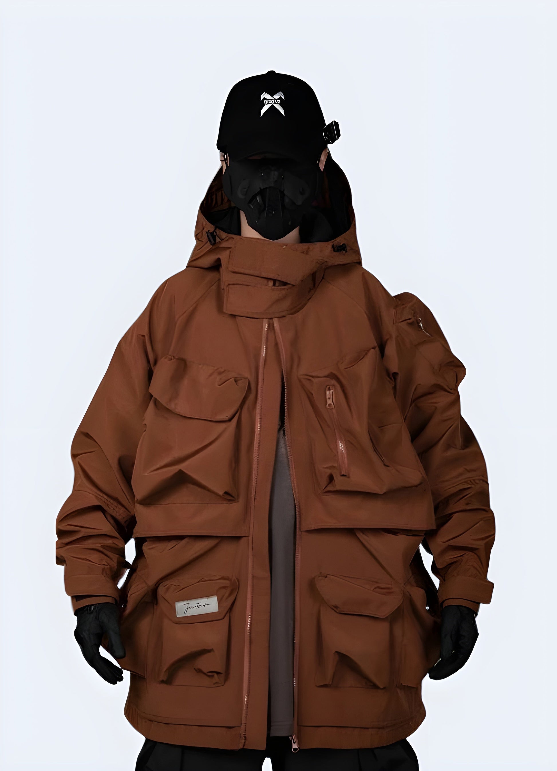 Bold orange techwear jacket with advanced materials and functional features, designed for urban exploration and everyday wear in Canada's dynamic environments while making a striking visual statement.