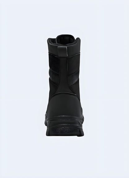 Back view of outdoor techwear boots, highlighting their sturdy heel support and reinforced design, ideal for conquering challenging Canada outdoor environments.