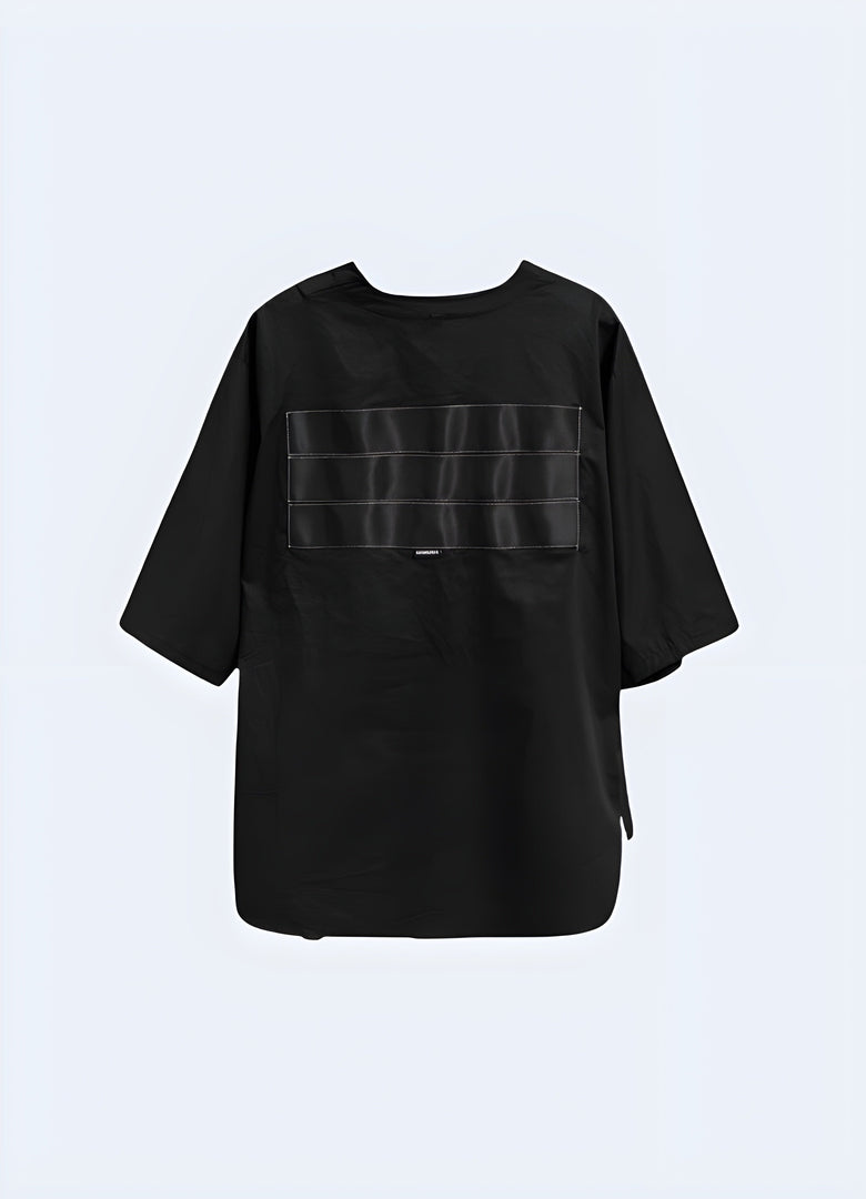 Back view of an oversized techwear shirt highlighting its relaxed fit and modern aesthetics, perfect for fashion-forward individuals in the Canada.