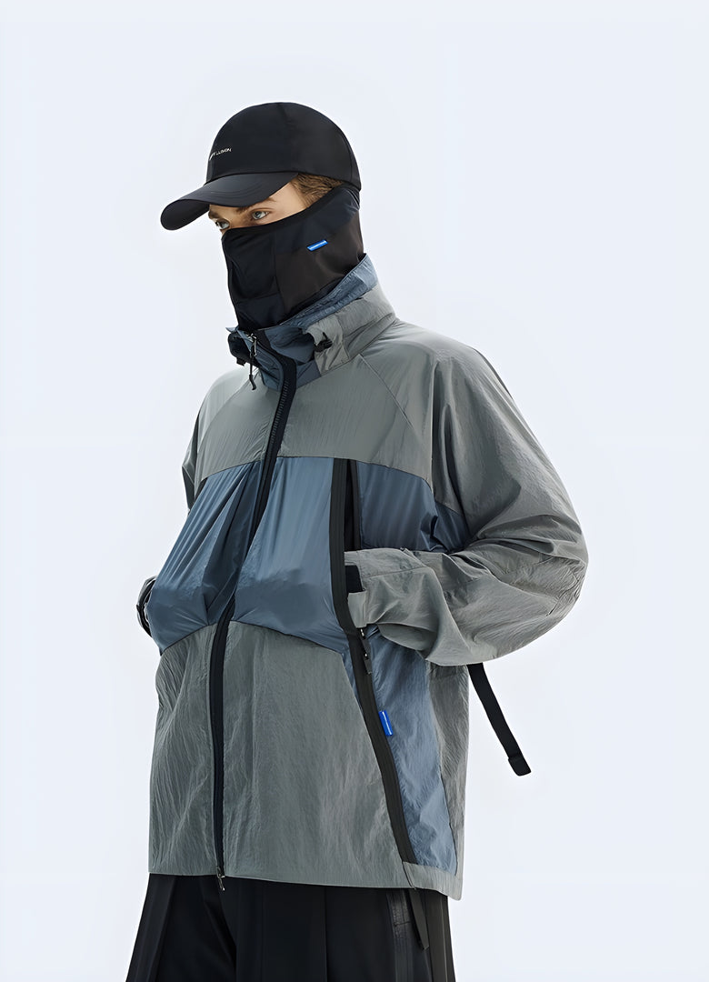 Unique purple techwear jacket with advanced materials and functional design elements, perfect for making a bold statement while navigating Canada's urban landscapes in comfort and style.