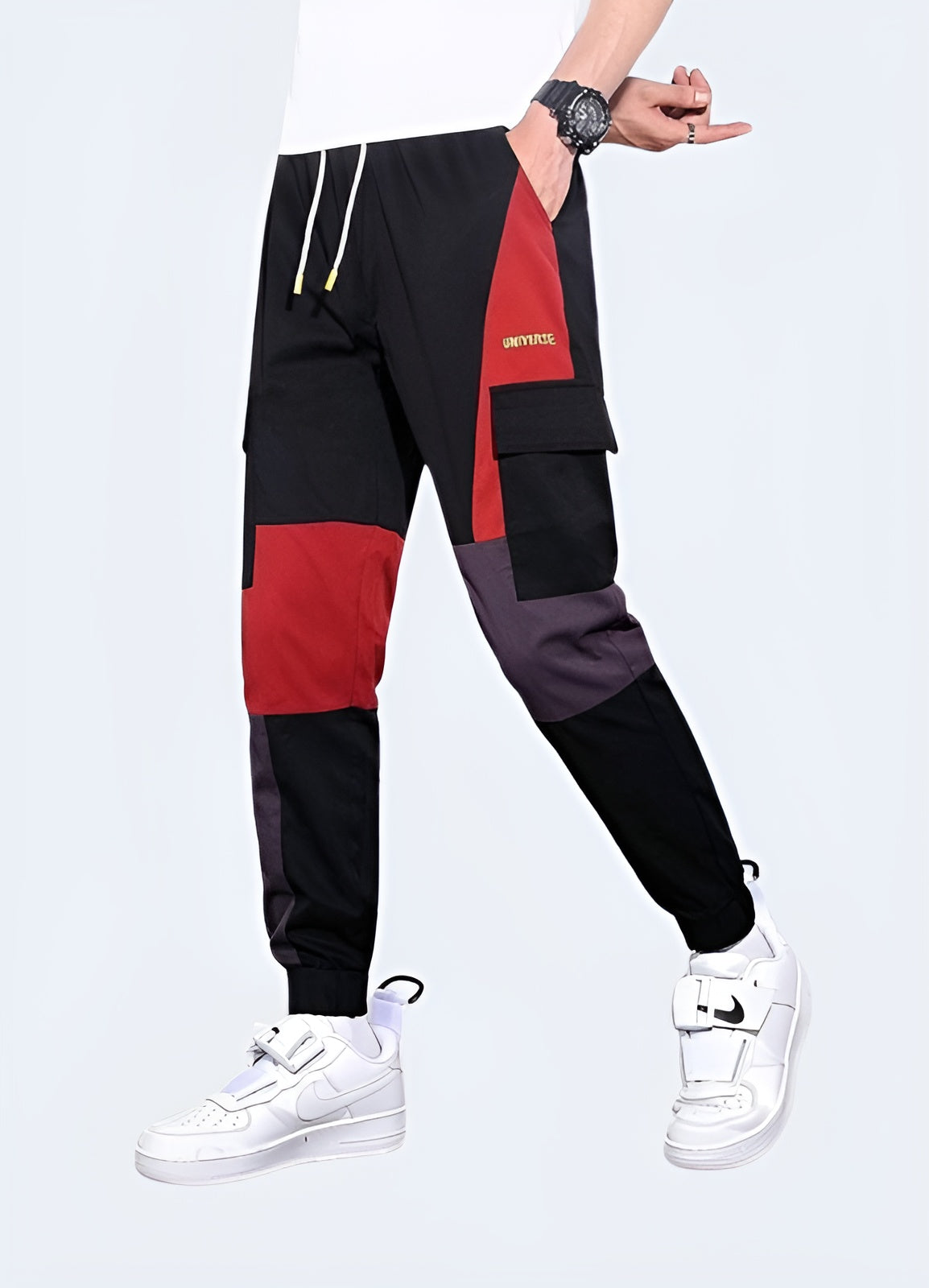 Vibrant red techwear pants featuring advanced materials and functional design, ideal for making a bold statement while staying comfortable in Canadian urban environments.