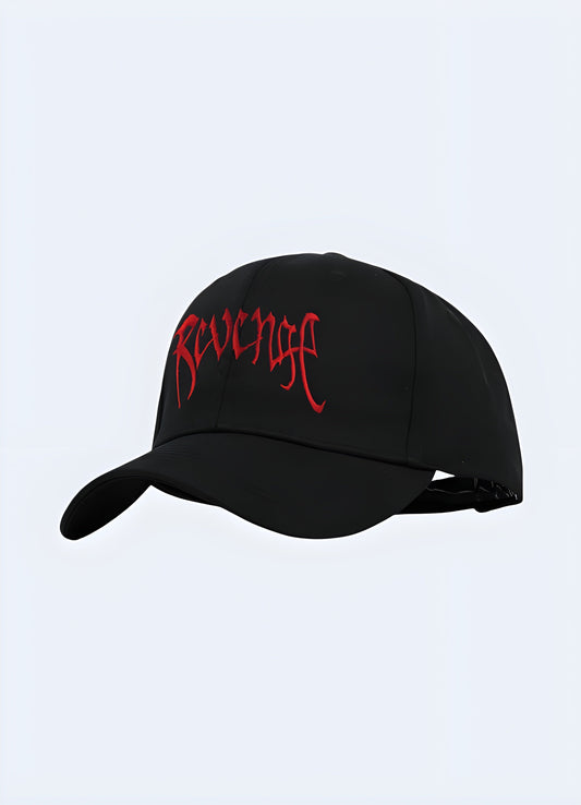 A black "Revenge" hat displayed from the front-side view, showcasing its sleek design with prominent lettering across the front Canada.