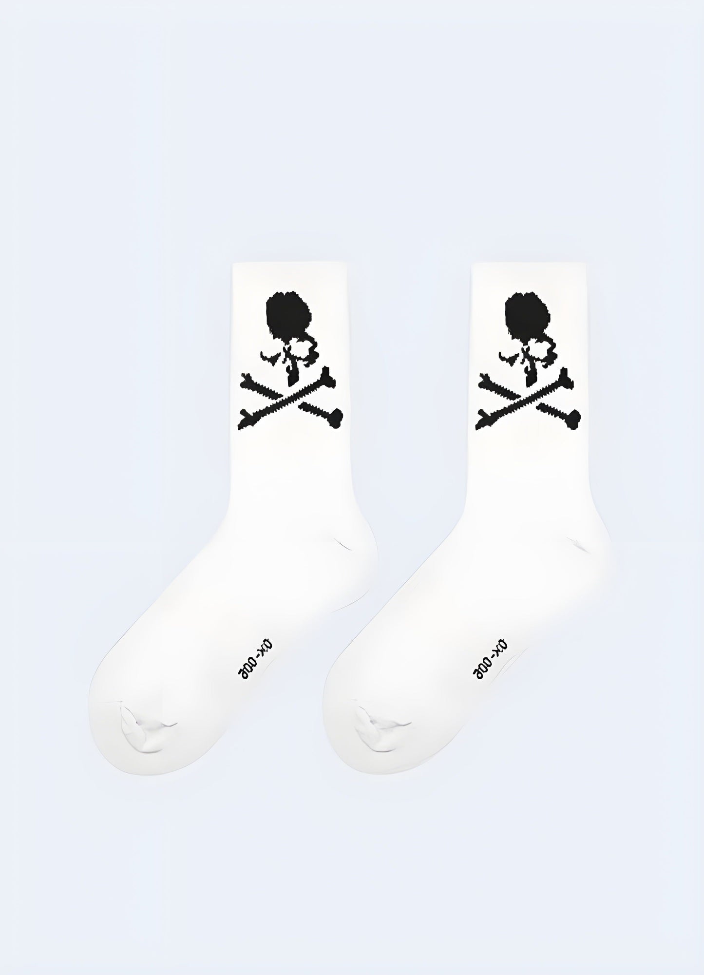 Side view of white skull street socks, showcasing the detailed and striking skull artwork that appeals to Canada fashion enthusiasts with a love for alternative and bold accessories.