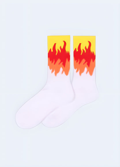 Side view of white socks featuring vibrant flame patterns, showcasing the eye-catching design that appeals to Canada fashion enthusiasts seeking a bold statement piece.