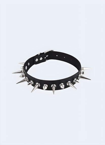 A bold spike choker necklace featuring sharp, evenly spaced spikes, set against a neutral background to highlight its edgy and daring design Canada.