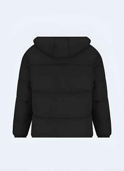 Back view of a fashionable streetwear puffer jacket, showcasing its unique design and insulating properties for cold Canadian weather.