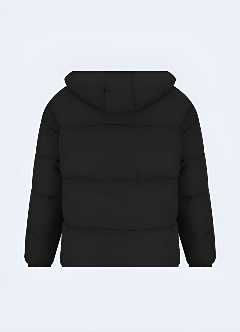 Back view of a fashionable streetwear puffer jacket, showcasing its unique design and insulating properties for cold Canadian weather.