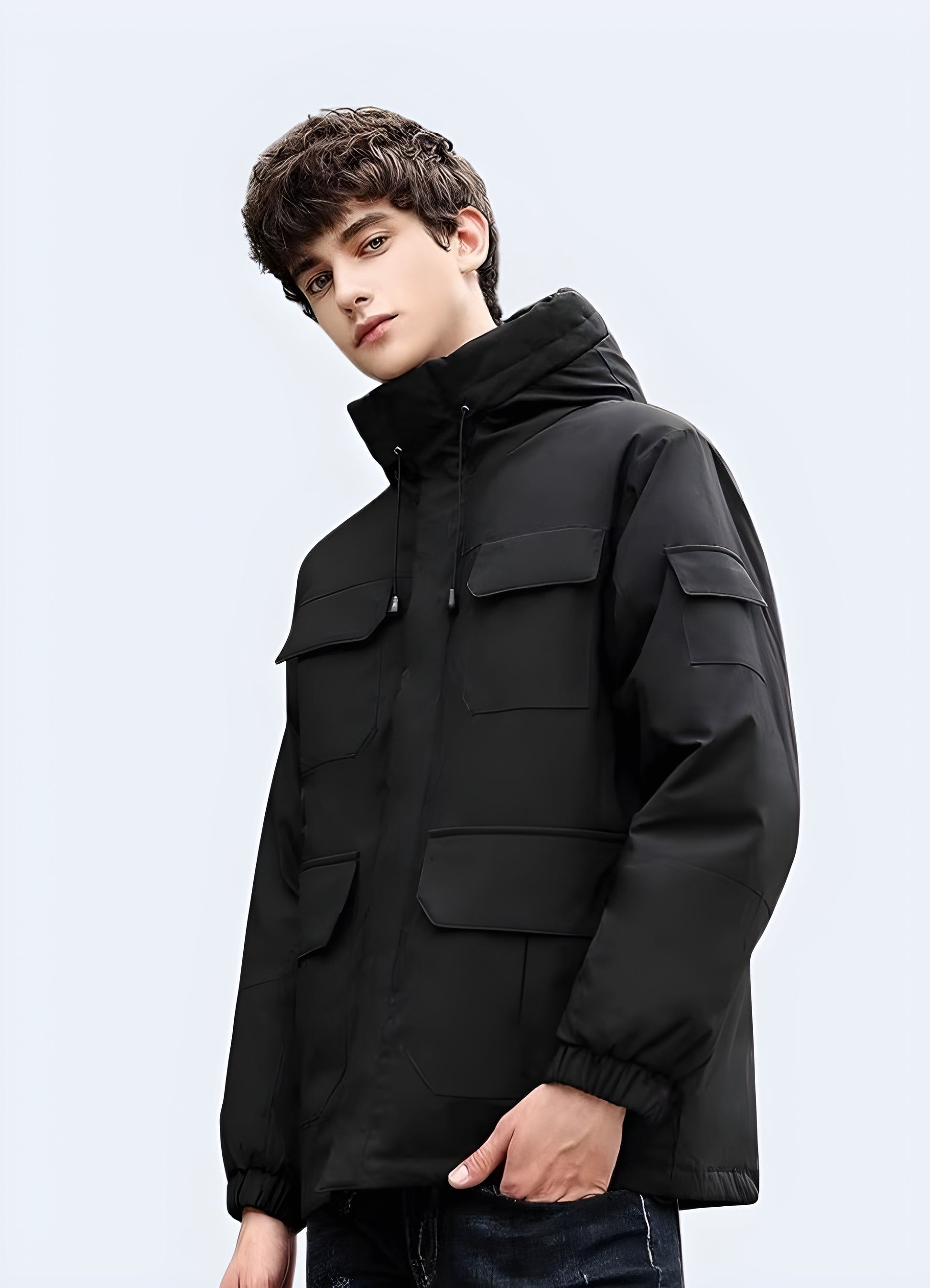 Black streetwear puffer jacket side view Canada — warm padded jacket with modern urban design and minimalist techwear look.