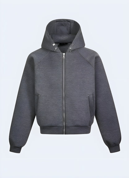 Streetwear round neck unisex zip-up hoodie in grey, front view, showcasing its sleek design and fashionable appeal in Canada.