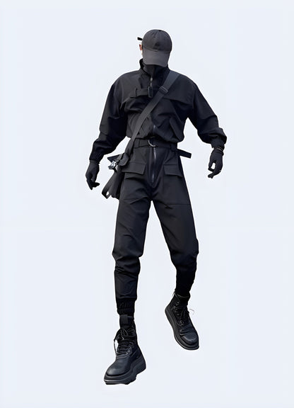 Durable black tactical black slim fit coverall with multiple pockets and straps, worn by a man in an urban Canadian setting, photographed from behind.