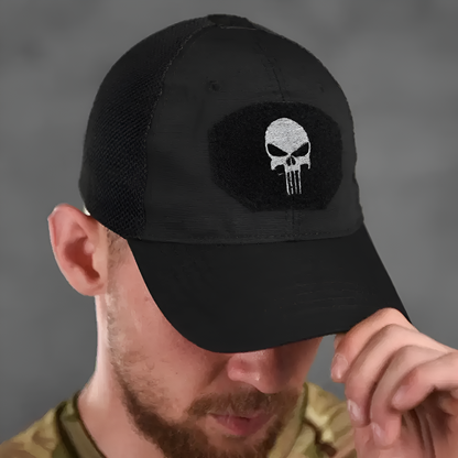 A model wearing a black tactical skull cap, shown from the front to highlight the cap’s snug fit and streamlined, utilitarian design.