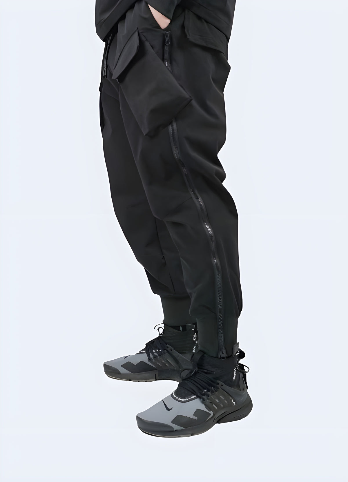 Close-up of the cargo pocket and waist detailing on the Technical Pants