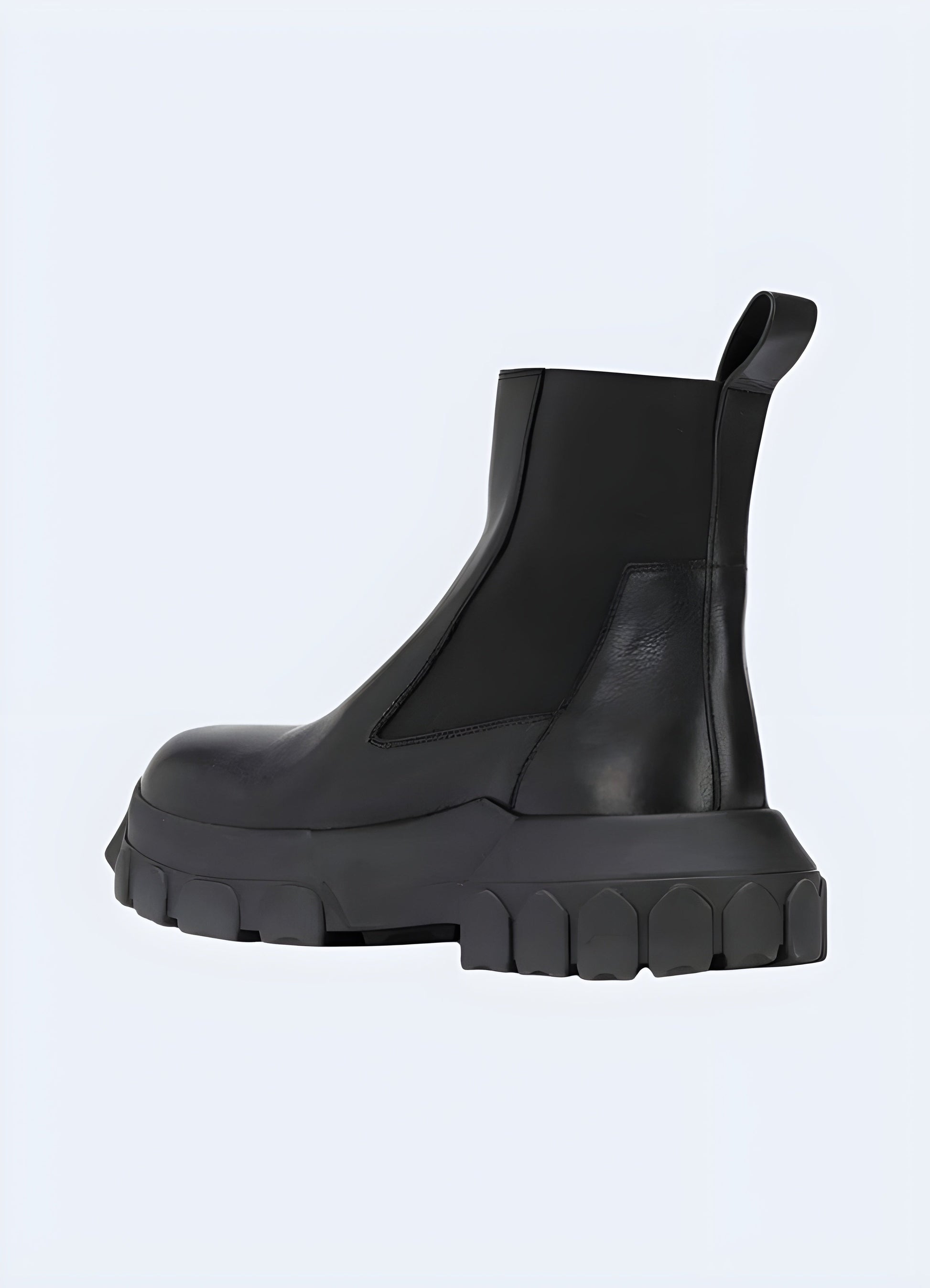 Back side view of techwear Chelsea boots, emphasizing their clean lines and durable construction, ideal for navigating Canada urban environments in style.