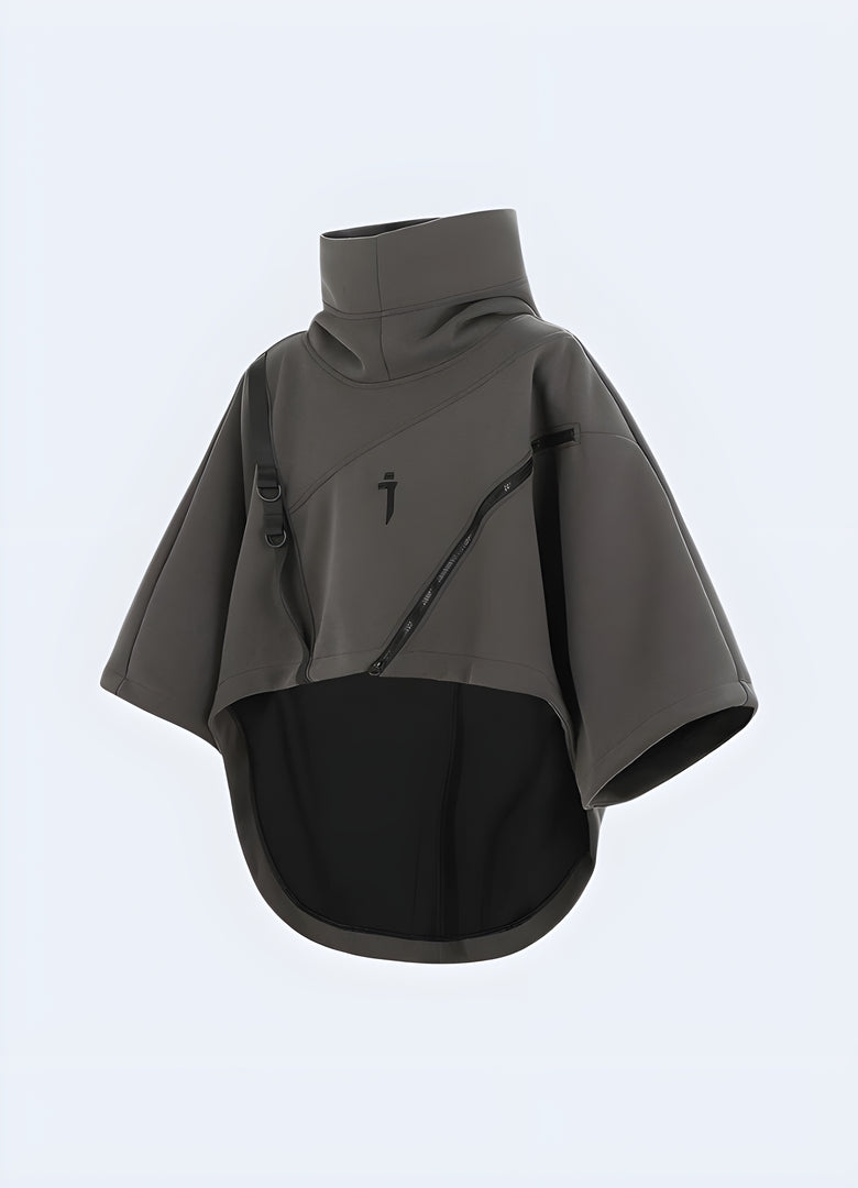 Front view of a grey poncho hoodie showcasing a unique, loose-fitting design and a large hood, perfect for a bold fashion statement or staying warm in chilly conditions.