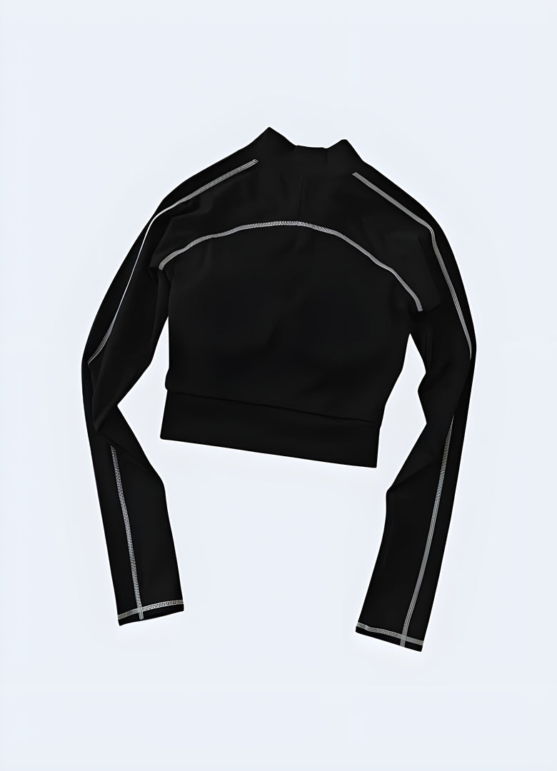 Woman wearing a stylish and modern techwear crop top, showcasing contemporary fashion in Canada.