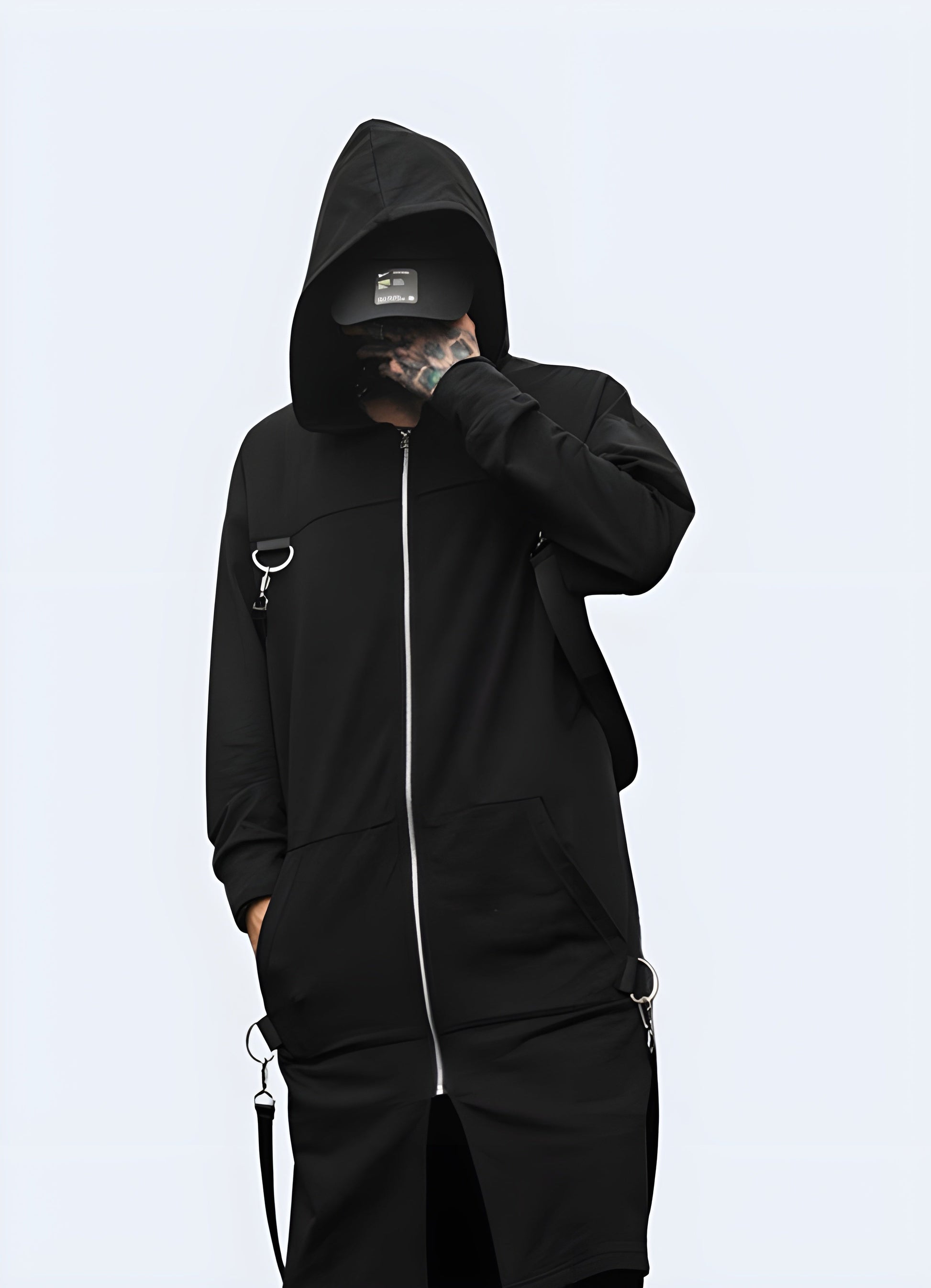 Innovative techwear long cloak with straps designed for urban exploration and futuristic fashion, blending cutting-edge technology with avant-garde style in the Canada.