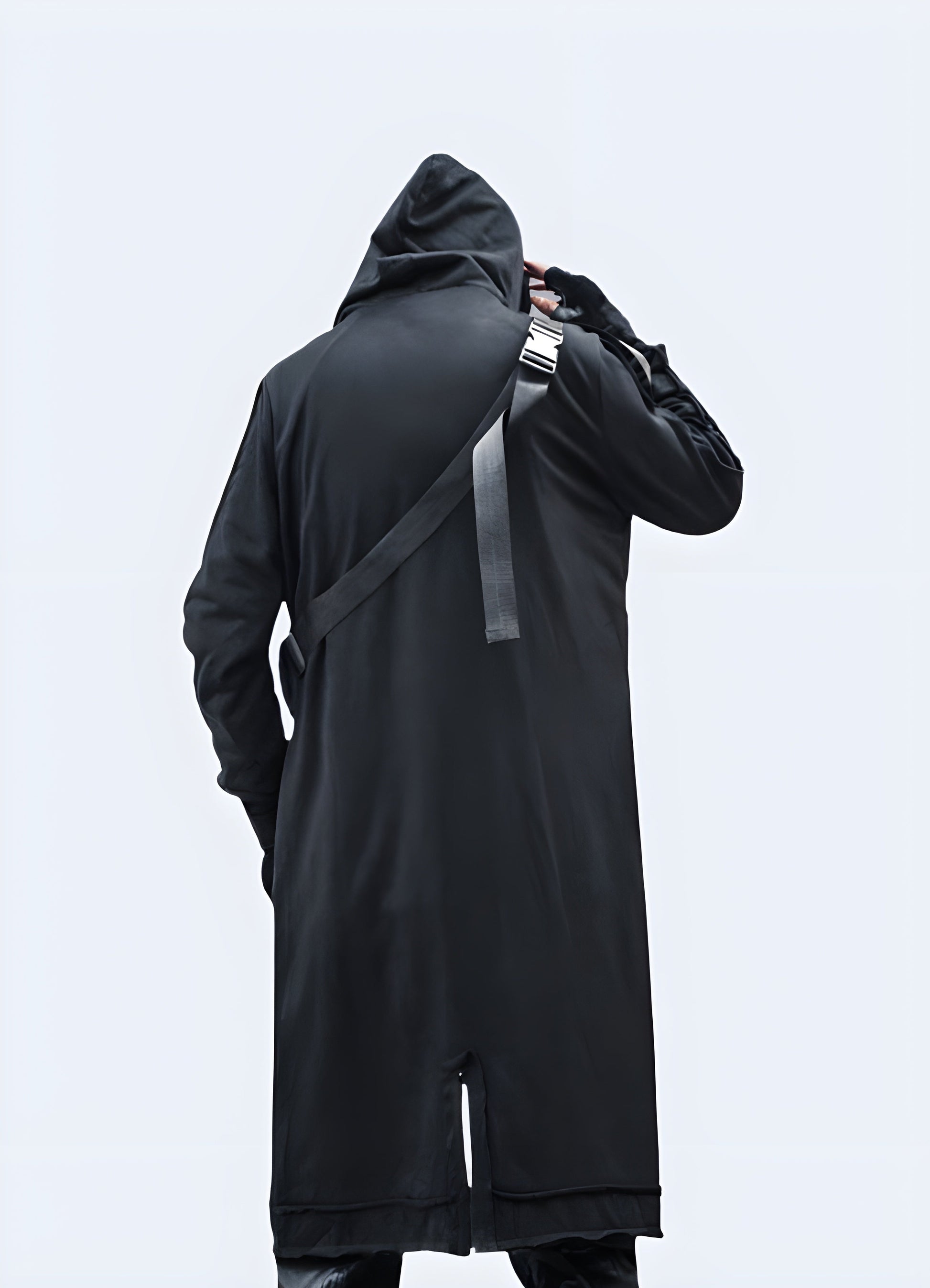 Back view of a stylish techwear overcoat, showcasing its unique design and practical features, perfect for navigating Canadian cities in style.