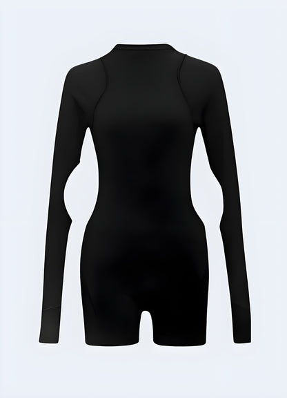 Innovative black techwear playsuit with unique design features, perfect for Canada fashion enthusiasts seeking cutting-edge urban wear.