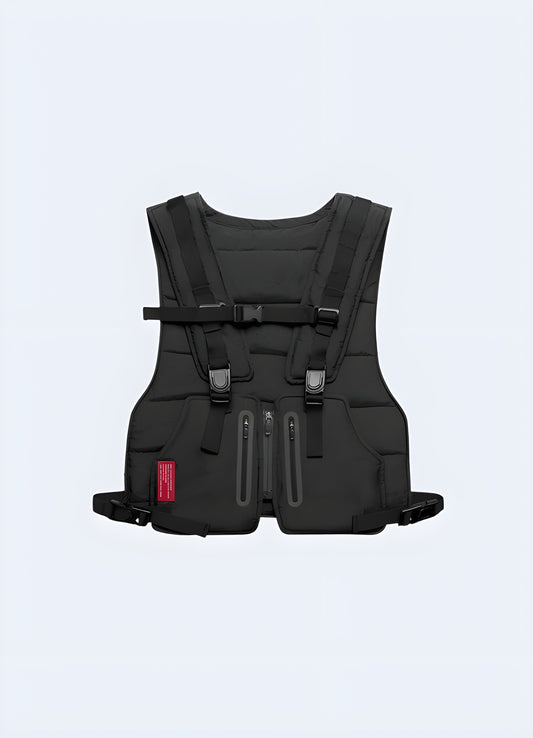 Front view of a black techwear running vest featuring multiple storage compartments, adjustable fit, and a modern, streamlined design for functional style.