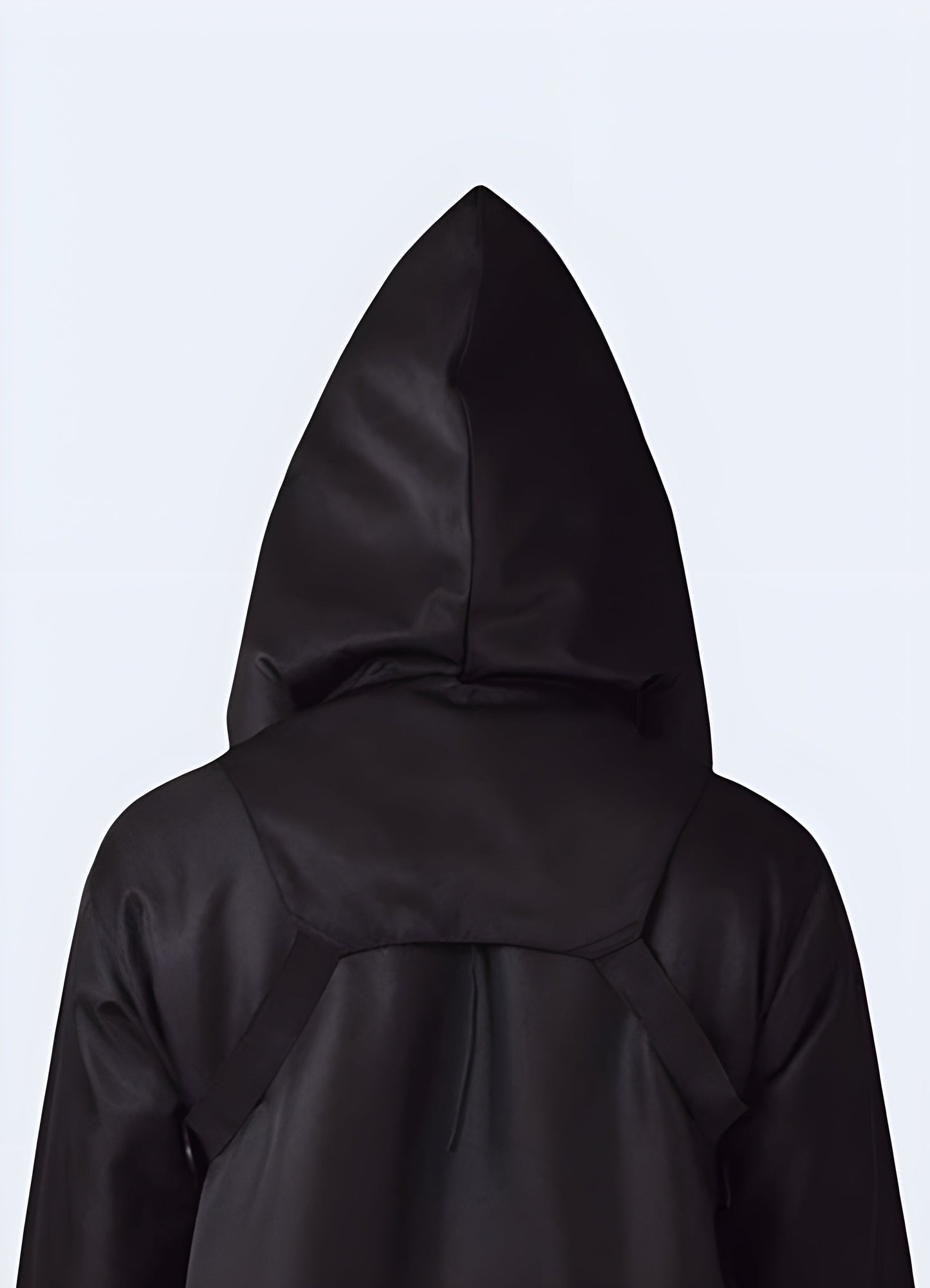 A black techwear scarf with a hood shown in a back view, highlighting its sleek design and versatility in the Canada.