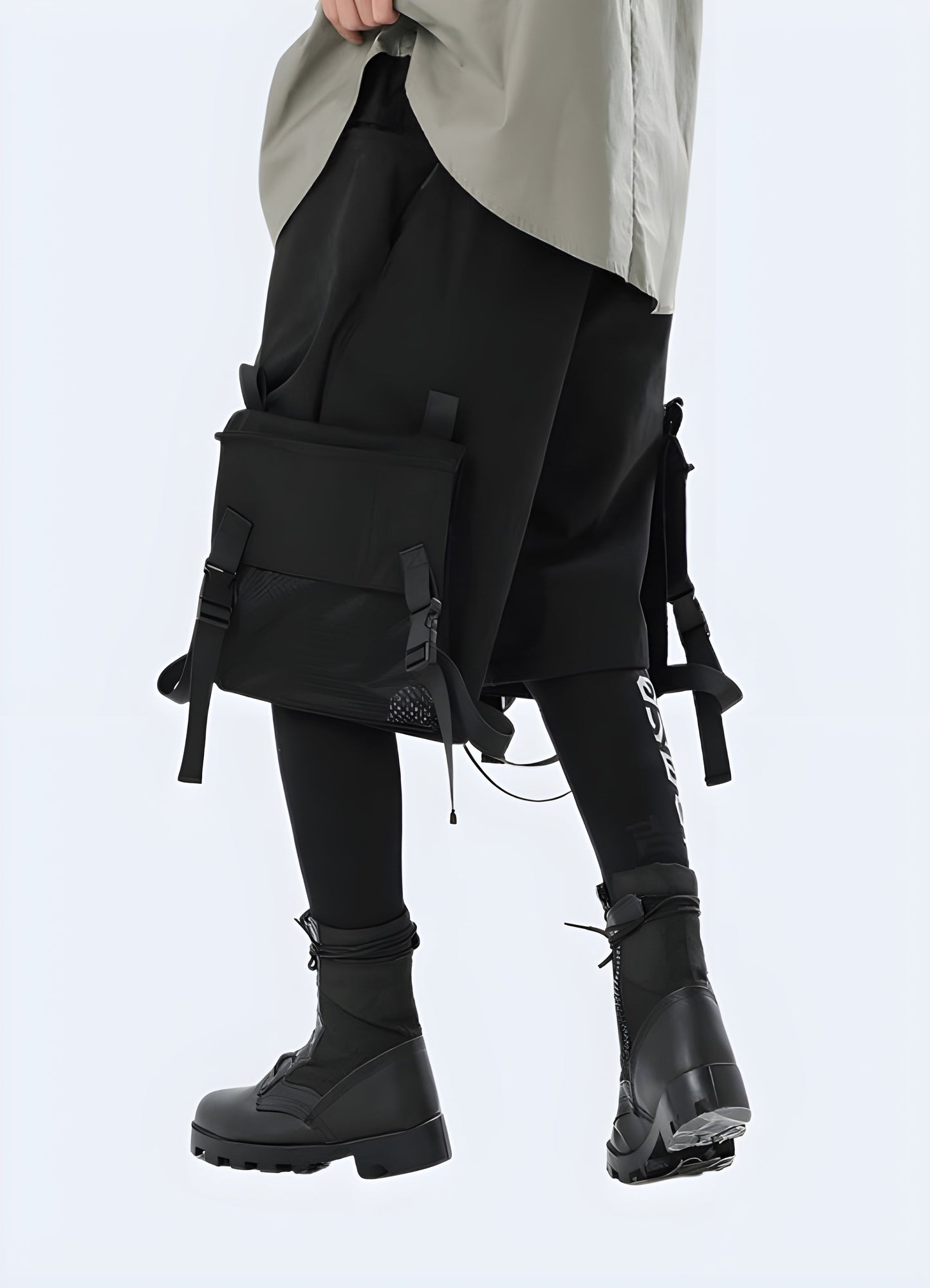 Left view of black techwear shorts with detachable cargo pockets kanji, showcasing the practical design and ample storage space, ideal for the outdoor enthusiast.